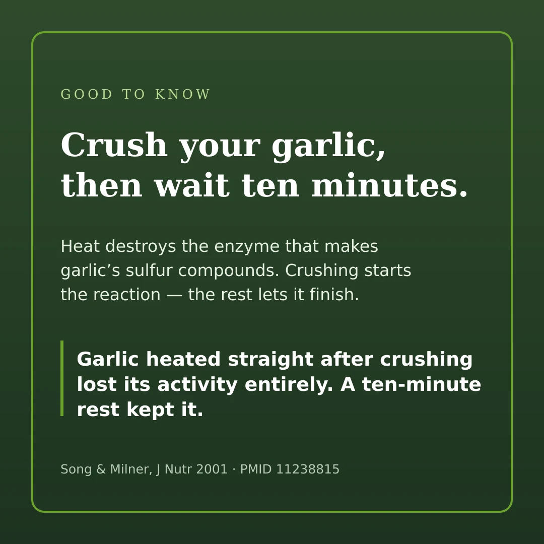 A dark green card reading: Crush your garlic, then wait ten minutes.